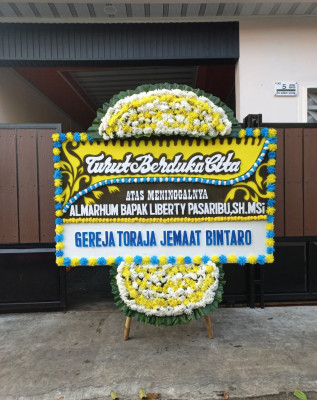 Papan Bunga Duka di Madidir Weru
