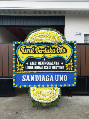 Papan Bunga Duka di Madidir Weru